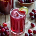 Cran Grape juice glass with a lemon